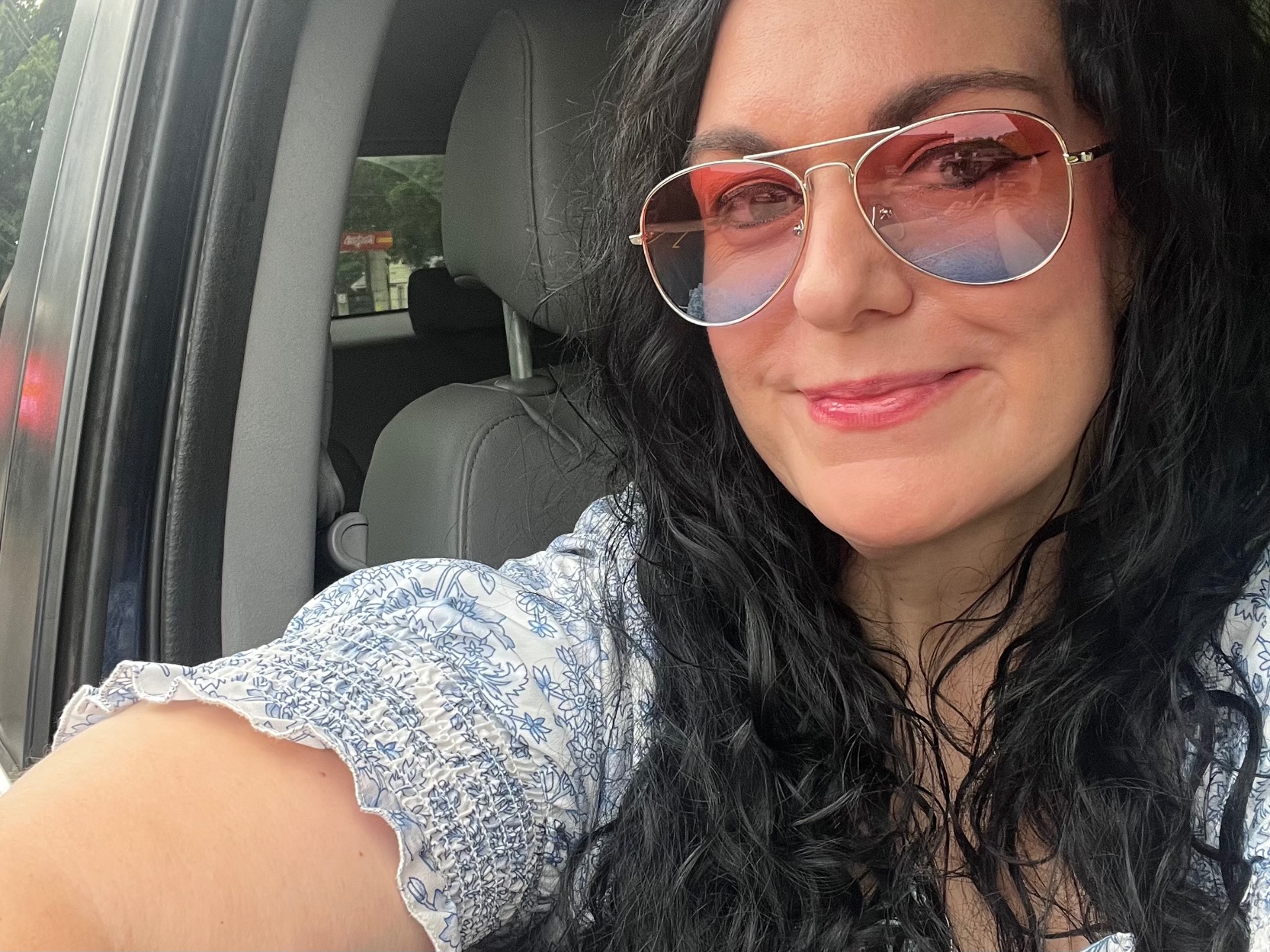 Angelica in sunglasses on an everyday drive